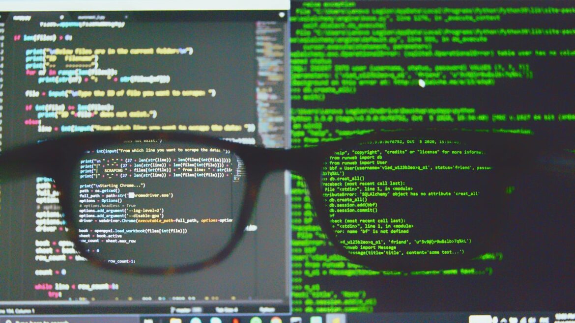 black framed eyeglasses on computer screen